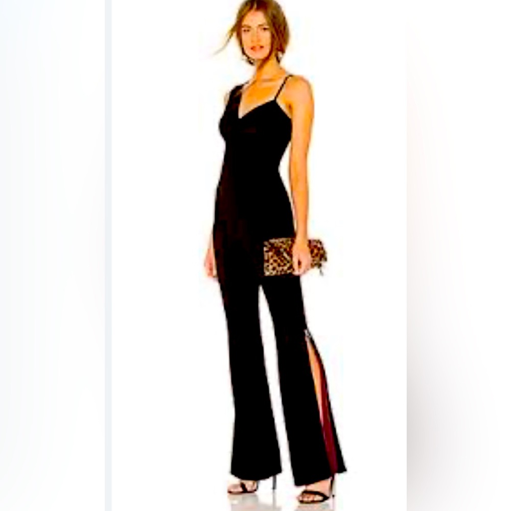 Donna Mizani Pipin One Shoulder Jumpsuit. Sold  Out Everywhere! Size small.